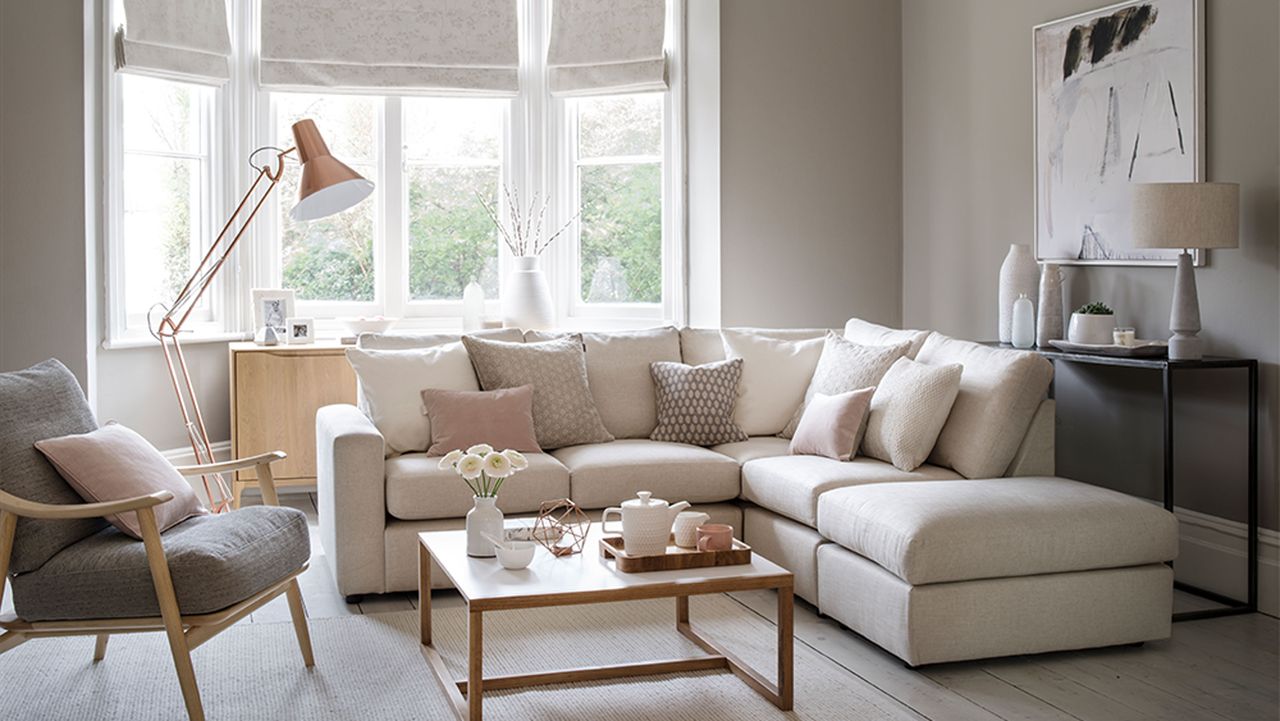 neutral living room with corner sofa and coffee table