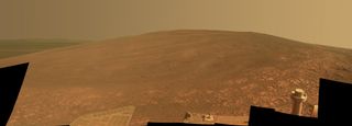 This image from NASA's Opportunity rover shows the "Murray Ridge" portion of the western rim of Endeavour Crater on Mars. The ridge was named in honor of the late Bruce Murray, a pioneering planetary geologist and former director of NASA's Jet Propulsion Laboratory.