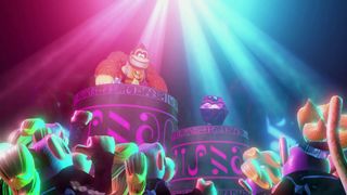 Donkey Kong Bananza DK and purple rock standing in front of monkey disco crowd