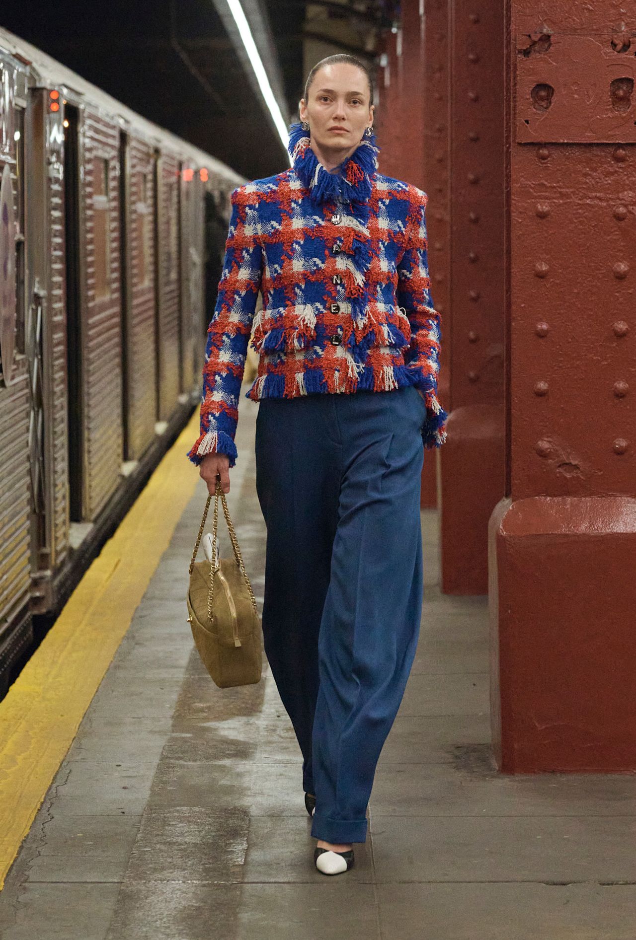 models walk the subway runway for the chanel metiers d'art 2026 show in new york city