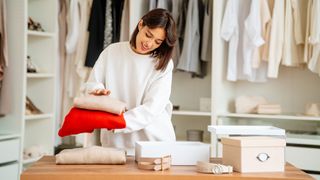 Woman sorting out clothing