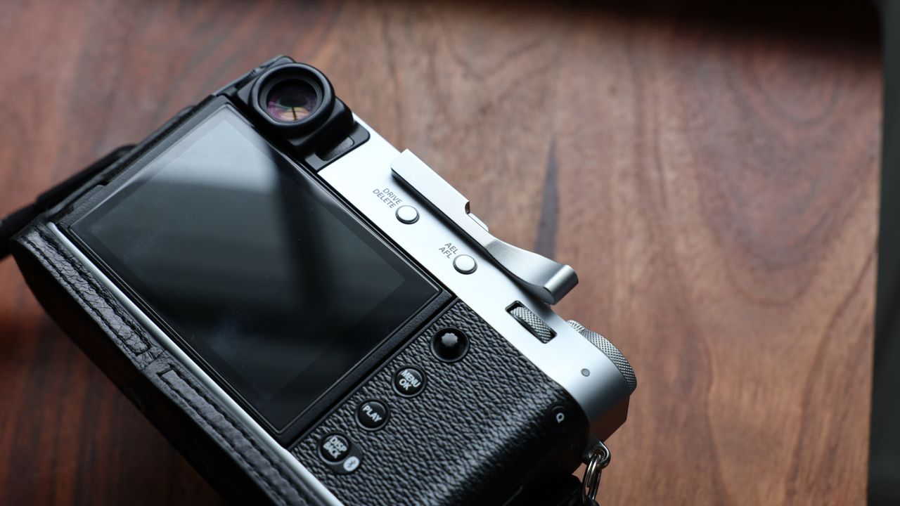 Fujifilm X100VI camera on a wooden table