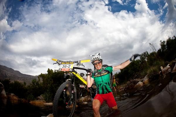 Mixed category race leader Esther Suss takes on a river crossing