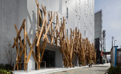 One@Tokyo hotel by Kengo Kuma, exterior view with wood batons across façade