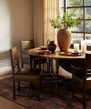 small dining room space with large rug