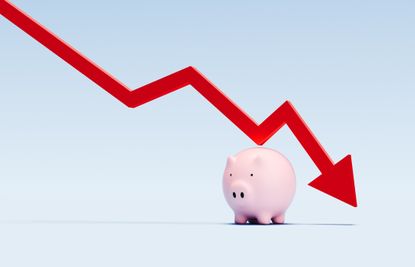 This image shows a red arrow line graph descending above a piggy bank, representing a decline in savings or financial performance.