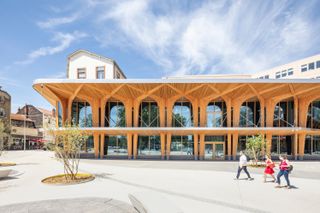 Michelin headquarters in France with timber entrance pavilion