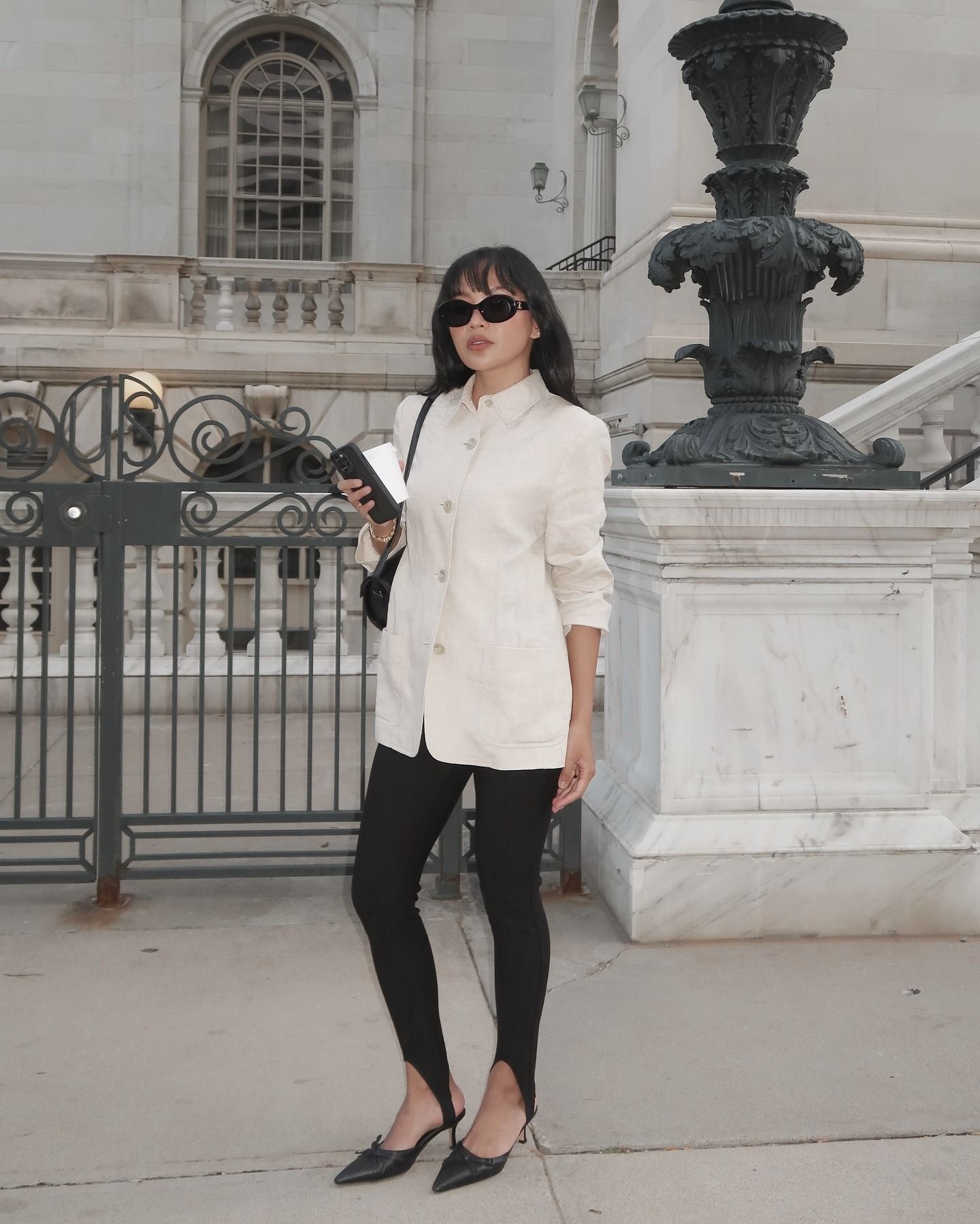 Woman wearing stirrup leggings.