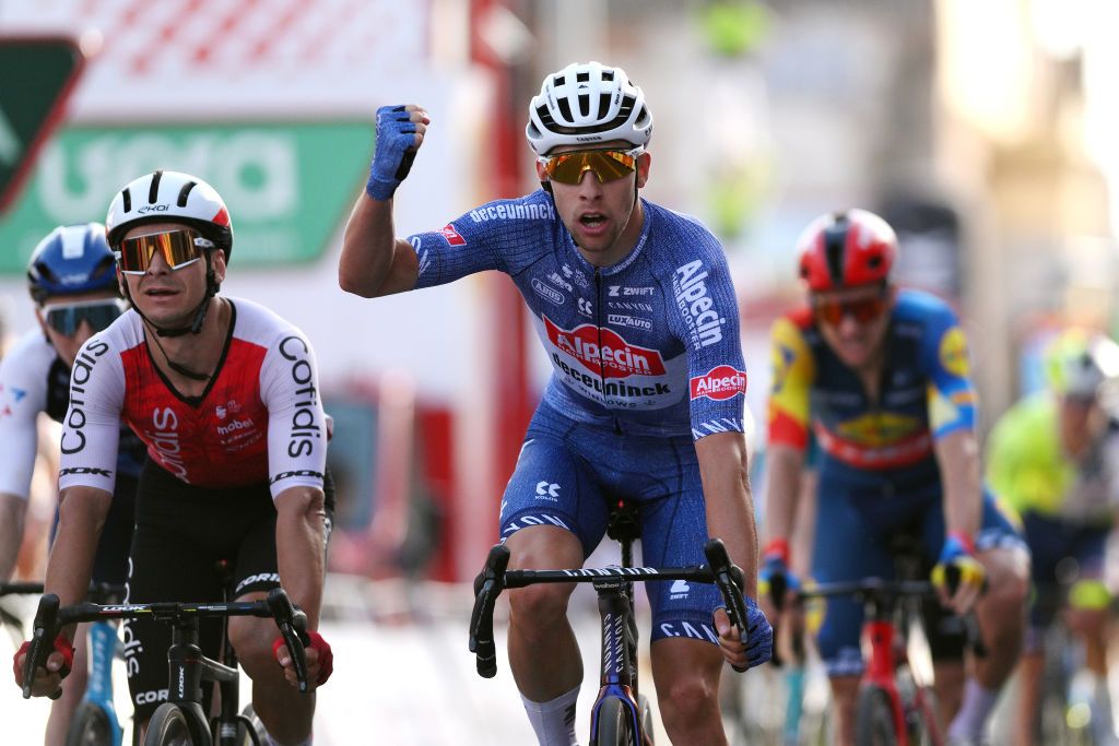 VILADECANS SPAIN MARCH 22 Axel Laurance of France and Team AlpecinDeceuninck R celebrates at finish line as stage winner ahead of Bryan Coquard of France and Team Cofidis L during the 103rd Volta Ciclista a Catalunya 2024 Stage 5 a 1673km stage from Altafulla to Viladecans UCIWT on March 22 2024 in Viladecans Spain Photo by David RamosGetty Images