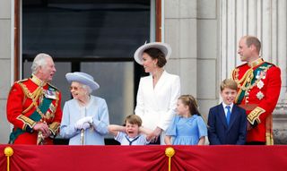 Prince Louis balcony: LONDON, UNITED KINGDOM - JUNE 02: (EMBARGOED FOR PUBLICATION IN UK NEWSPAPERS UNTIL 24 HOURS AFTER CREATE DATE AND TIME) Prince Charles, Prince of Wales, Queen Elizabeth II, Prince Louis of Cambridge, Catherine, Duchess of Cambridge, Princess Charlotte of Cambridge, Prince George of Cambridge and Prince William, Duke of Cambridge watch a flypast from the balcony of Buckingham Palace during Trooping the Colour on June 2, 2022 in London, England. Trooping The Colour, also known as The Queen's Birthday Parade, is a military ceremony performed by regiments of the British Army that has taken place since the mid-17th century. It marks the official birthday of the British Sovereign. This year, from June 2 to June 5, 2022, there is the added celebration of the Platinum Jubilee of Elizabeth II in the UK and Commonwealth to mark the 70th anniversary of her accession to the throne on 6 February 1952. (Photo by Max Mumby/Indigo/Getty Images)
