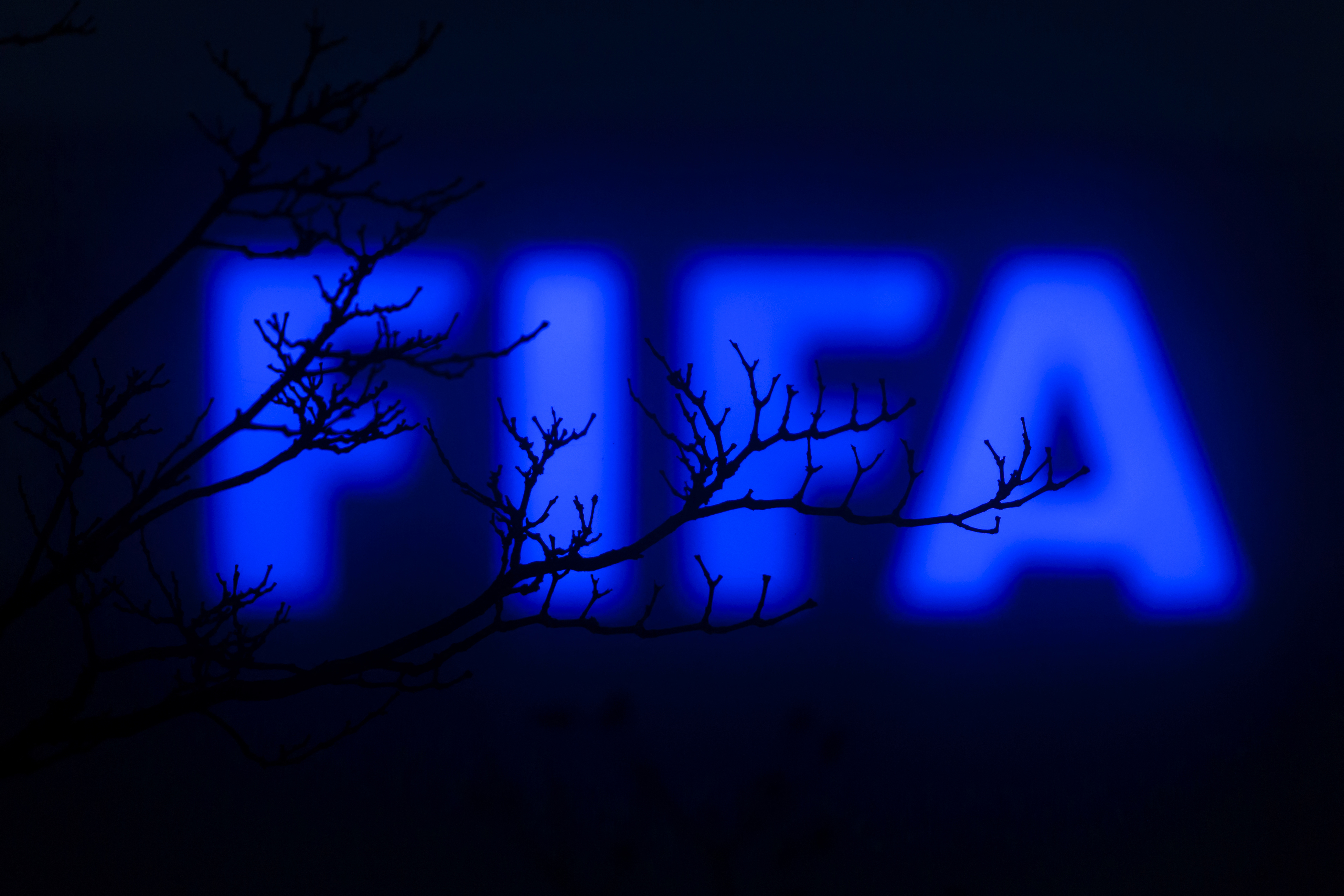TOPSHOT - This photo taken on December 3, 2015 in Zurich shows a sign outside of the FIFA headquarters. The unprecedented corruption scandal engulfing FIFA widened on December 3 with the arrests of two more top officials in another dramatic dawn raid at a luxury hotel in Zurich. (Photo by FABRICE COFFRINI / AFP) (Photo by FABRICE COFFRINI/AFP via Getty Images)