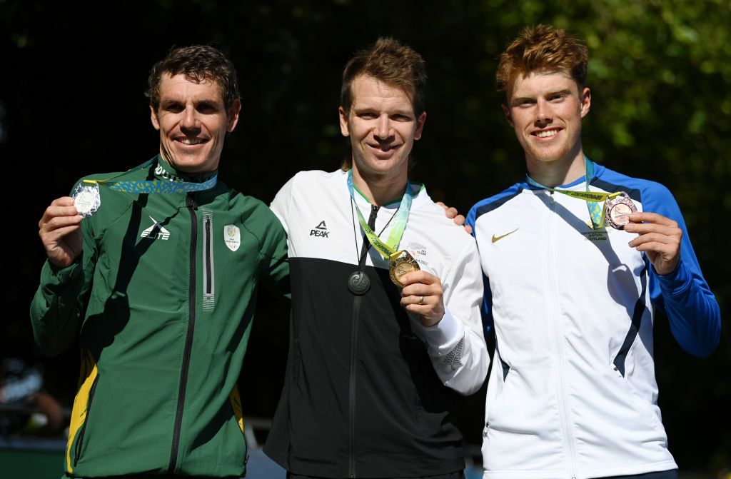 WARWICK ENGLAND AUGUST 07 L R Silver Medalist Daryl Impey of Team South Africa Gold Medalist Aaron Gate of Team New Zealand and Bronze Medalist Finn Crockett of Team Scotland pose with their medals during the Mens Road Race medal ceremony on day ten of the Birmingham 2022 Commonwealth Games at on August 07 2022 on the Warwick England Photo by Justin SetterfieldGetty Images