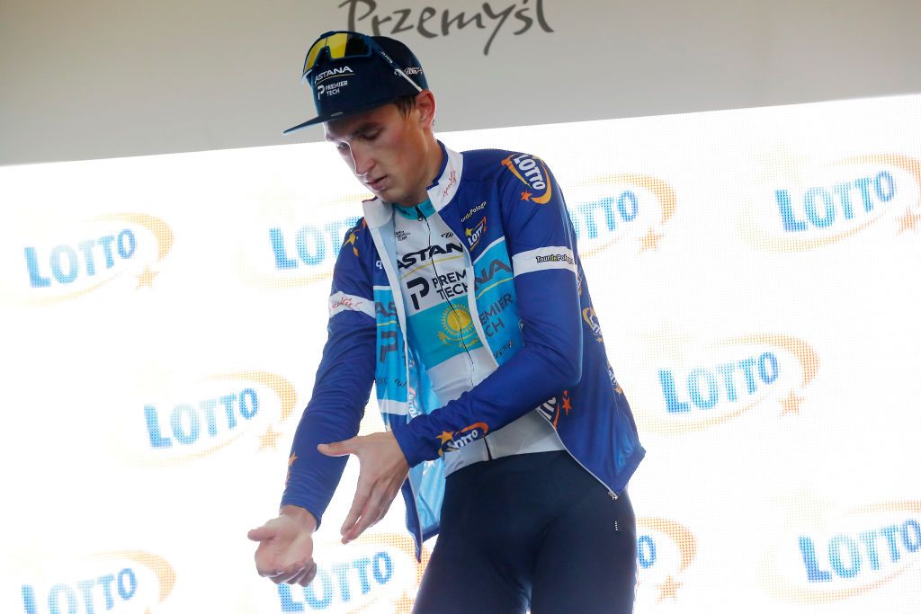 PRZEMYSL POLAND AUGUST 10 Yevgeniy Fedorov of Kazakhstan and Team Astana Premier Tech Blue Most Active Rider Jersey celebrates at Podium during the 78th Tour de Pologne 2021 Stage 2 a 201km stage from Zamo to Przemyl 341m TourdePologne TDP2021 UCIWT on August 10 2021 in Przemysl Poland Photo by Bas CzerwinskiGetty Images