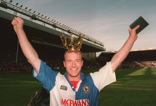 Alan Shearer celebrates Blackburn Rovers' Premier League title win in May 1995.