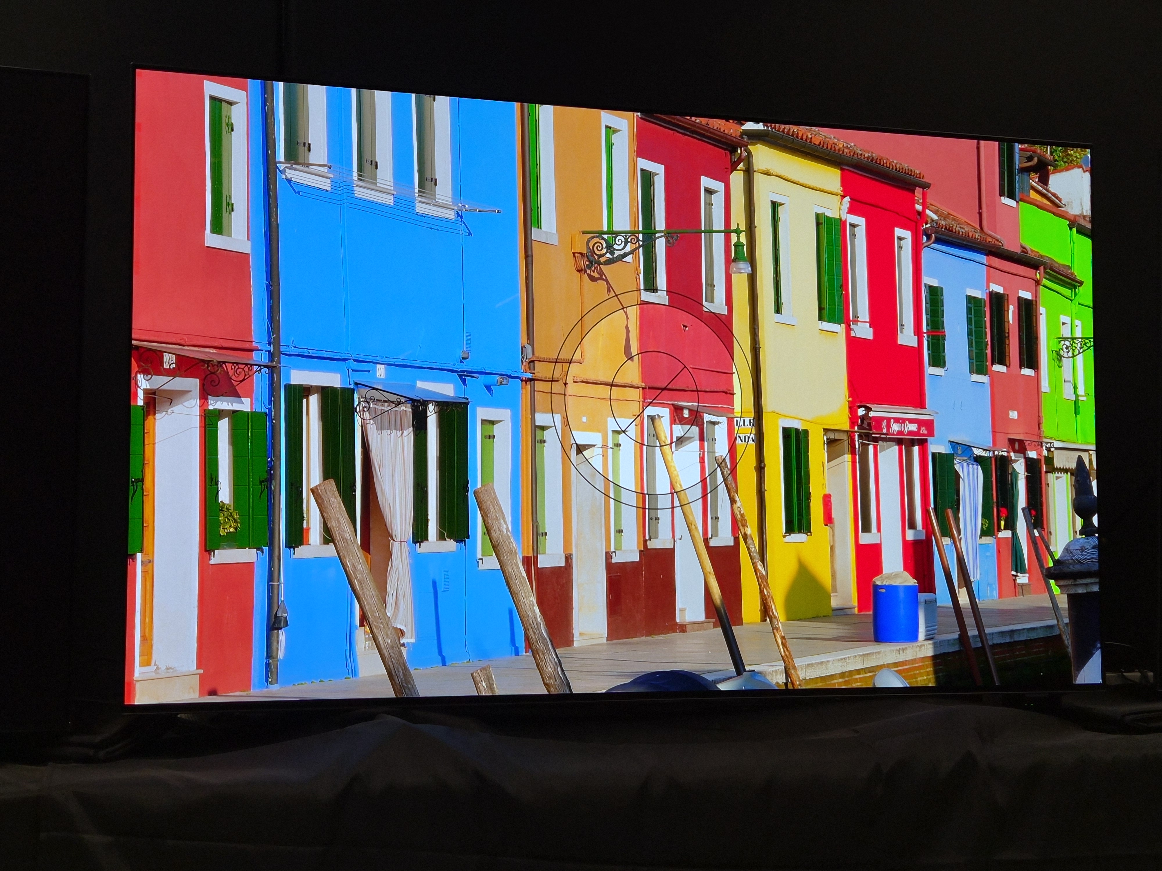 Philips OLED950 with coloured cottages on screen