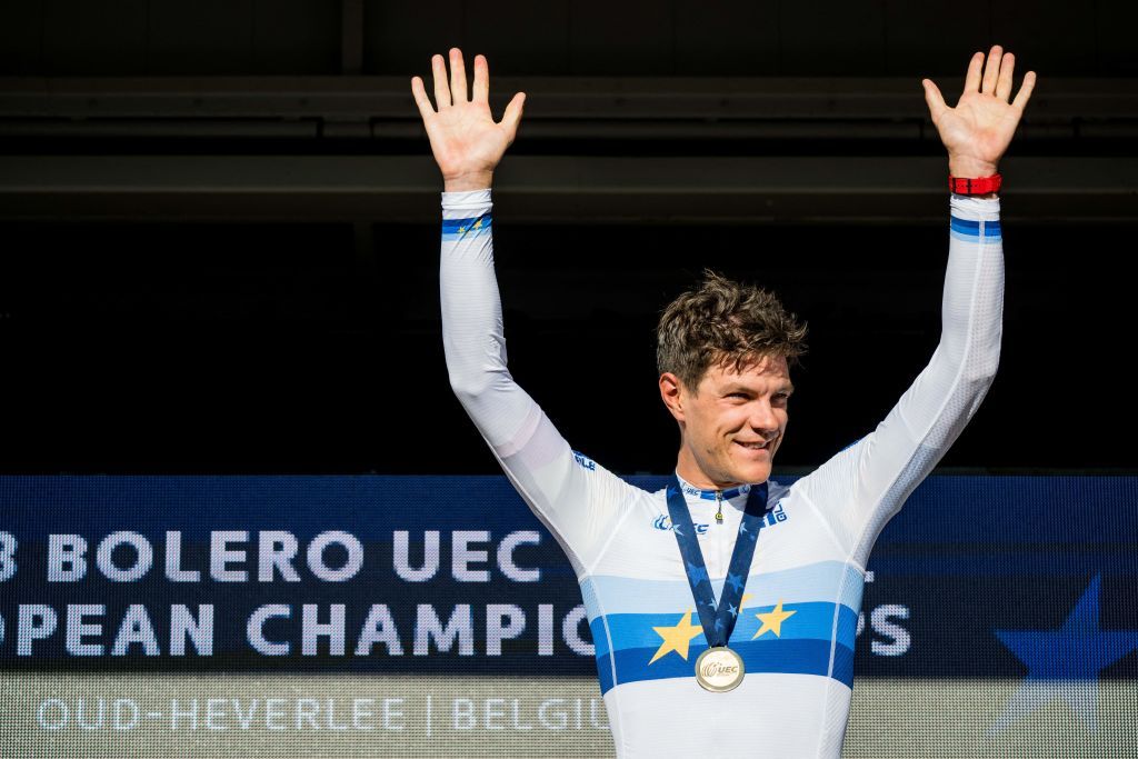 Belgian Jasper Stuyven celebrates on the podium after winning the elite race at the European and Belgian Gravel Championships Sunday 01 October 2023 in Heverlee Leuven BELGA PHOTO JASPER JACOBS Photo by JASPER JACOBS BELGA MAG Belga via AFP Photo by JASPER JACOBSBELGA MAGAFP via Getty Images