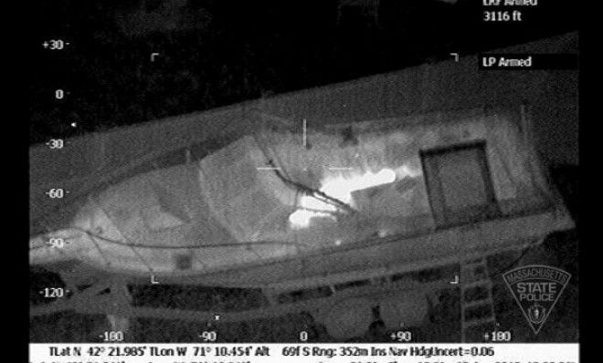 The boat in which Boston Marathon bombing suspect Dzhokhar Tsarnaev hid is seen from the Forward Looking Infrared setting of a police helicopter on April 19.