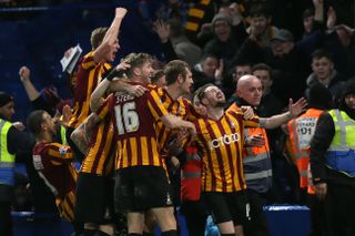 Bradford City players celebrate after Mark Yeates scored their fourth goal against Chelsea in the FA Cup, 2015