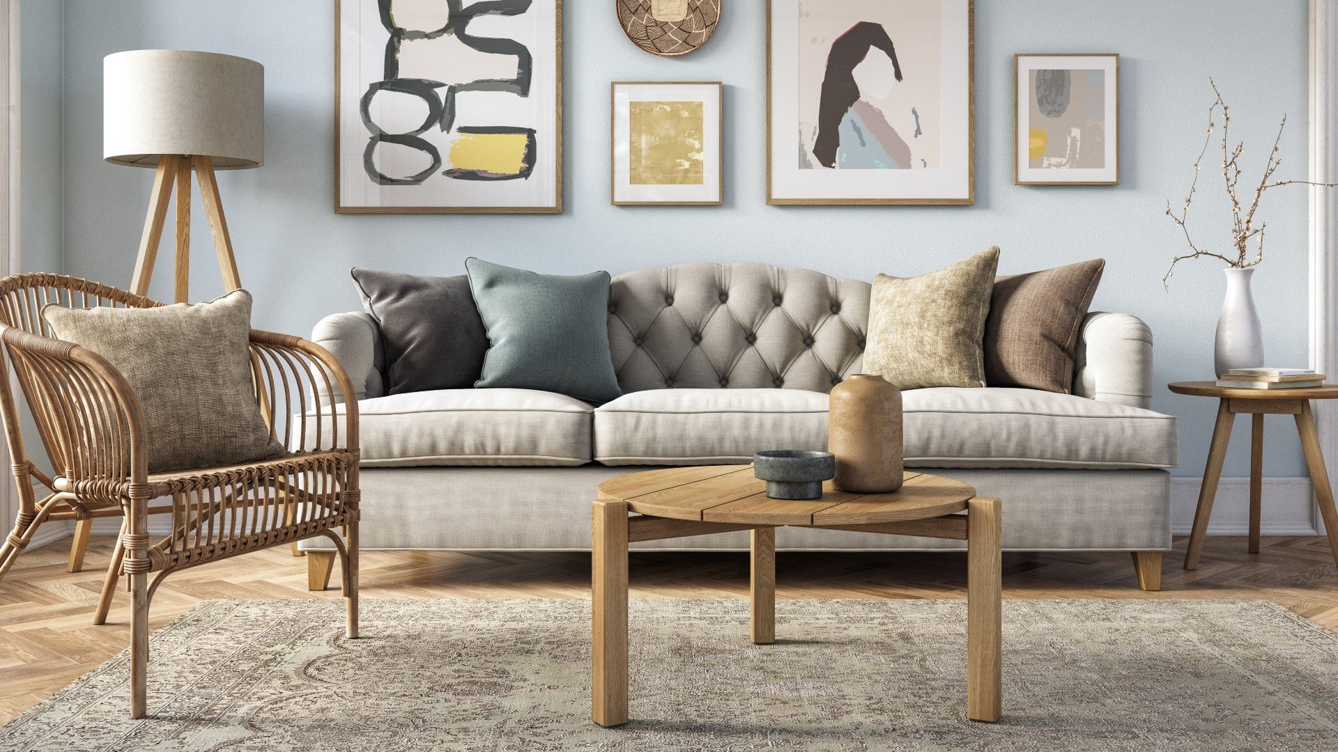 a colorful living room with artwork on the walls, a beige sofa, a rug, and wooden coffee table and side tables