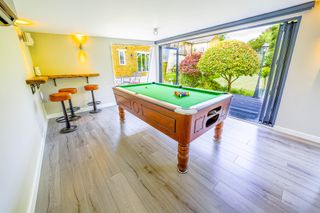 games room with pool table in garden room