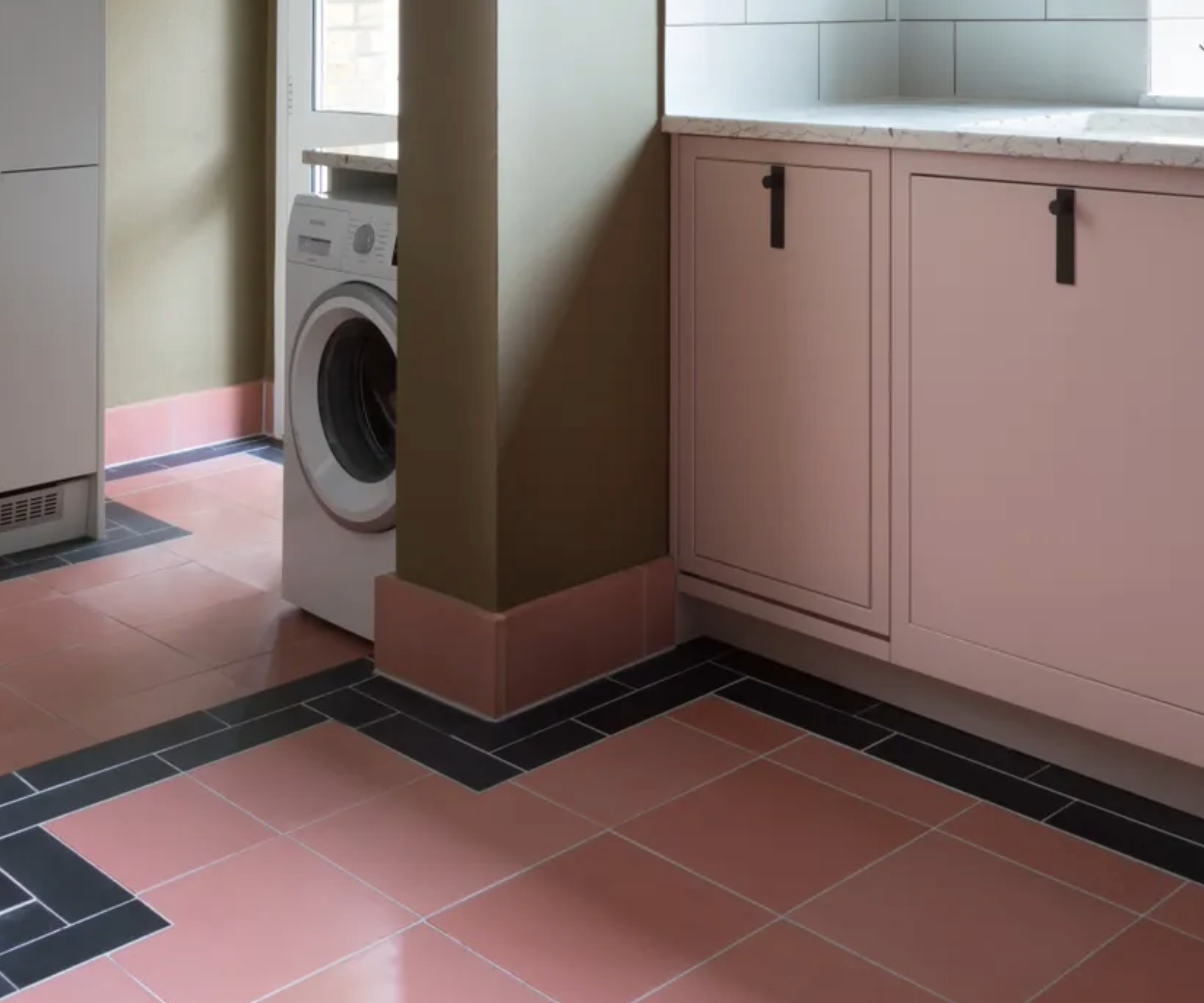 a utility room leading from a kitchen
