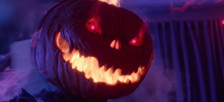 The Curse of Bridge Hollow's Stingy Jack in his full form, a giant pumpkin head