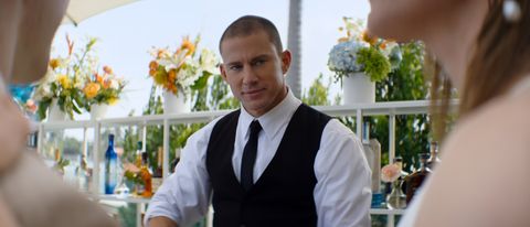 Channing Tatum serves drinks with a well-dressed smile in Magic Mike's Last Dance.