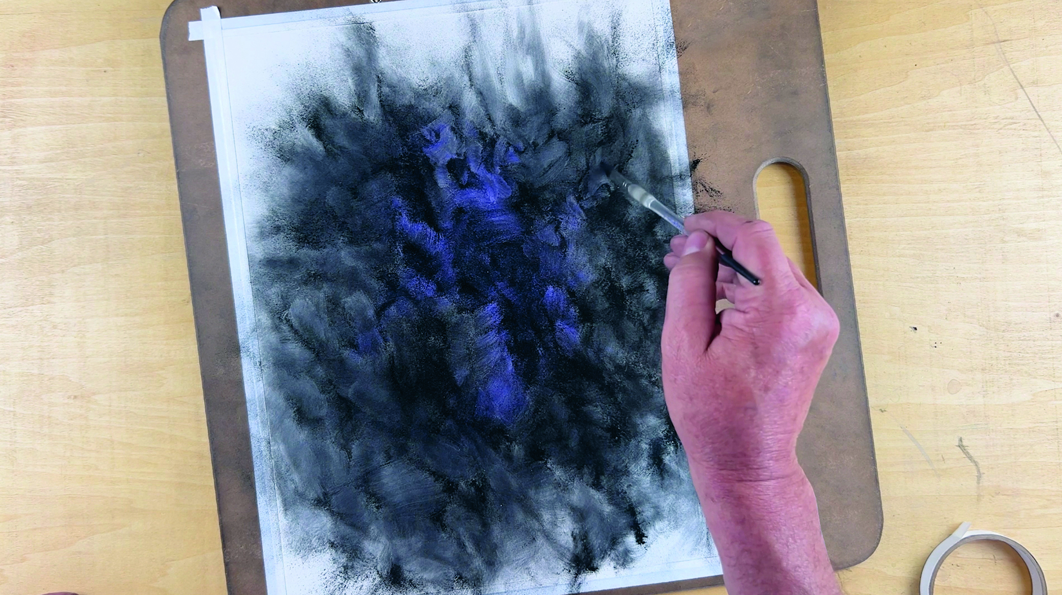 Image of a charcoal abstract character art in progress