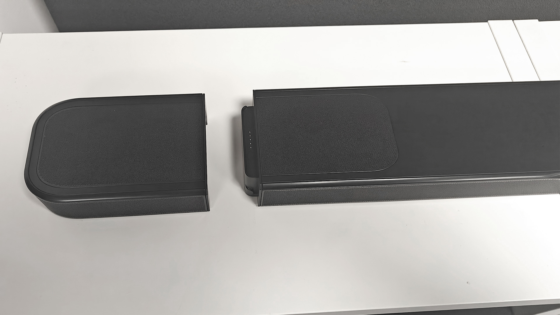 JBL Bar 1000MK2 soundbar system showing surround detached from soundbar