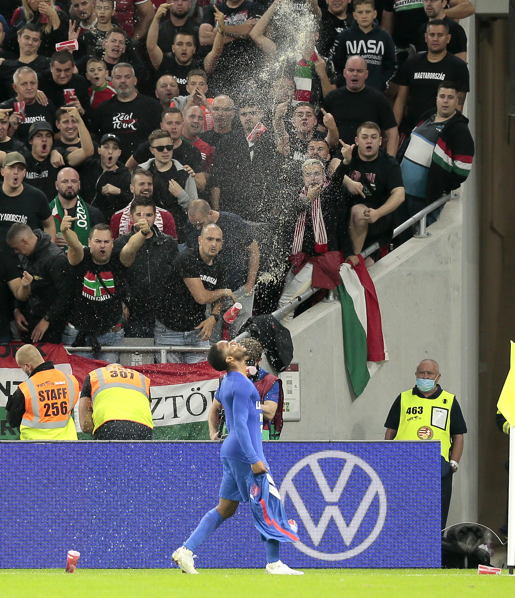 Cups are thrown at Sterling after his goal against Hungary in Budapest
