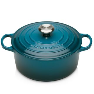 peacock blue cookware and white background