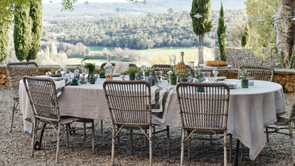 Dining table set on patio garden in French countryside