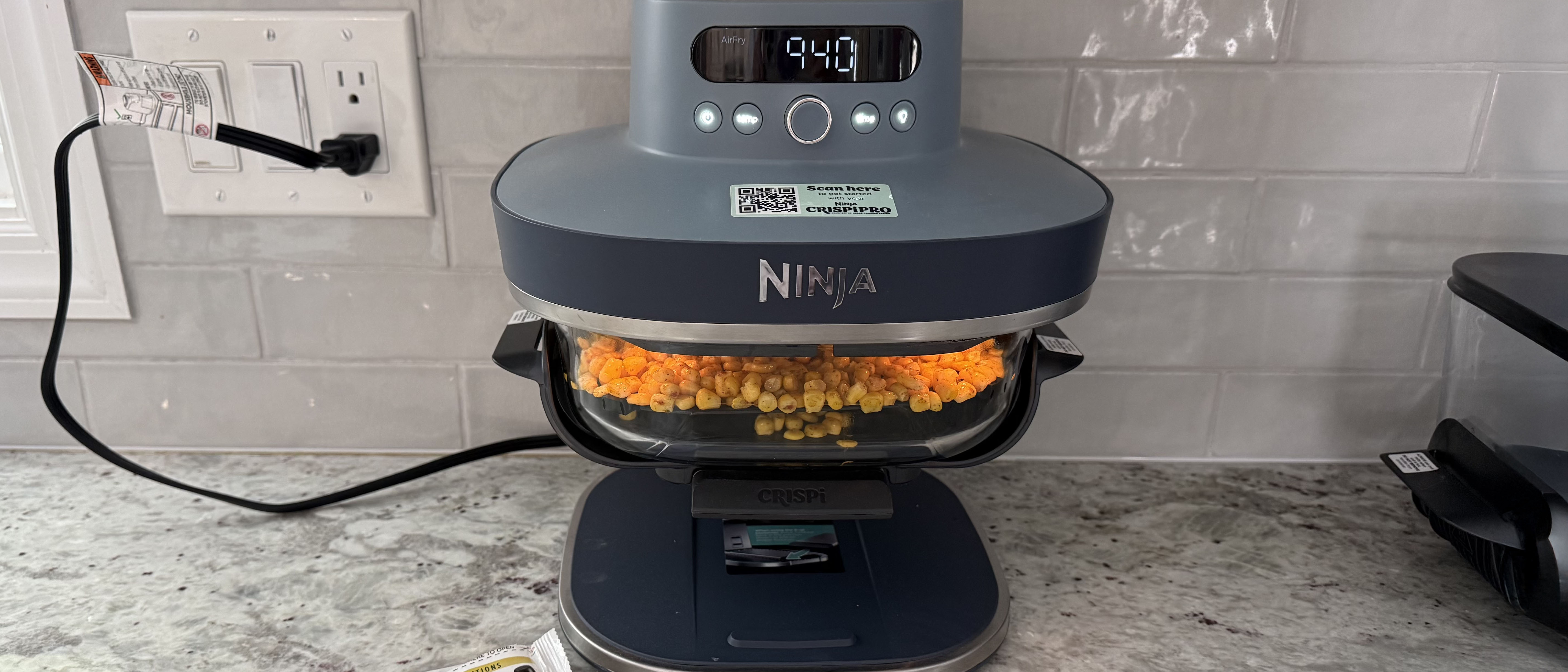 Ninja Crispi Pro air fryer cooking food