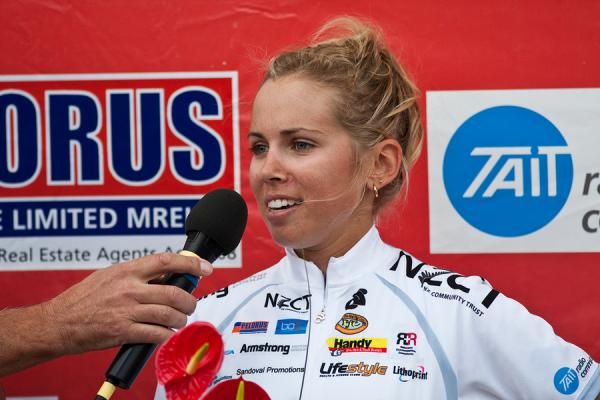 U23 classification leader Emily Collins (Cyclosport NZ) is interviewed on the presentation stage.