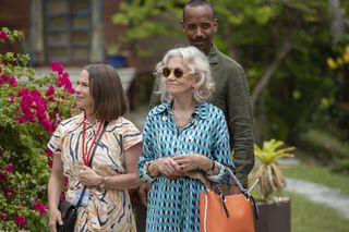 Nancy (Hayley Mills) walks around the gardens of the Paradise Bay care home with Eloise (Juliet Cowan) and Phillipe (Kevin Harvey)