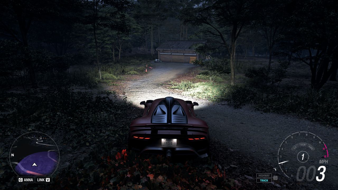 Forza Horizon 6 Barn Finds: A player parked outside an old wooden barn on a wooded hillside at night.