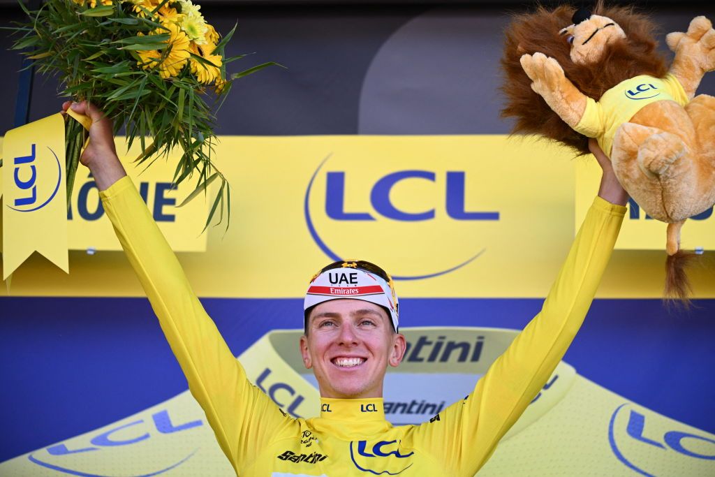 Slovenian Tadej Pogacar of UAE Team Emirates celebrates on the podium after winning stage seven of the Tour de France cycling race a 176 km race from Tomblaine to La Super Planche des Belles Filles France on Friday 08 July 2022 This years Tour de France takes place from 01 to 24 July 2022 BELGA PHOTO POOL JASPER JACOBS UK OUT Photo by JASPER JACOBS BELGA MAG Belga via AFP Photo by JASPER JACOBSBELGA MAGAFP via Getty Images