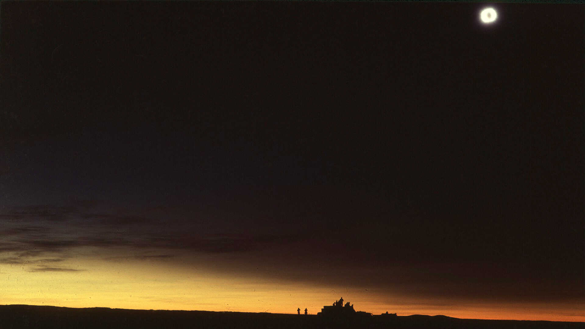 The sky and surrounding landscape, during mid-totality of the total solar eclipse of February 26, 1979 from Roy, Montana.