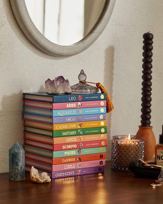 Stack of rainbow colored books