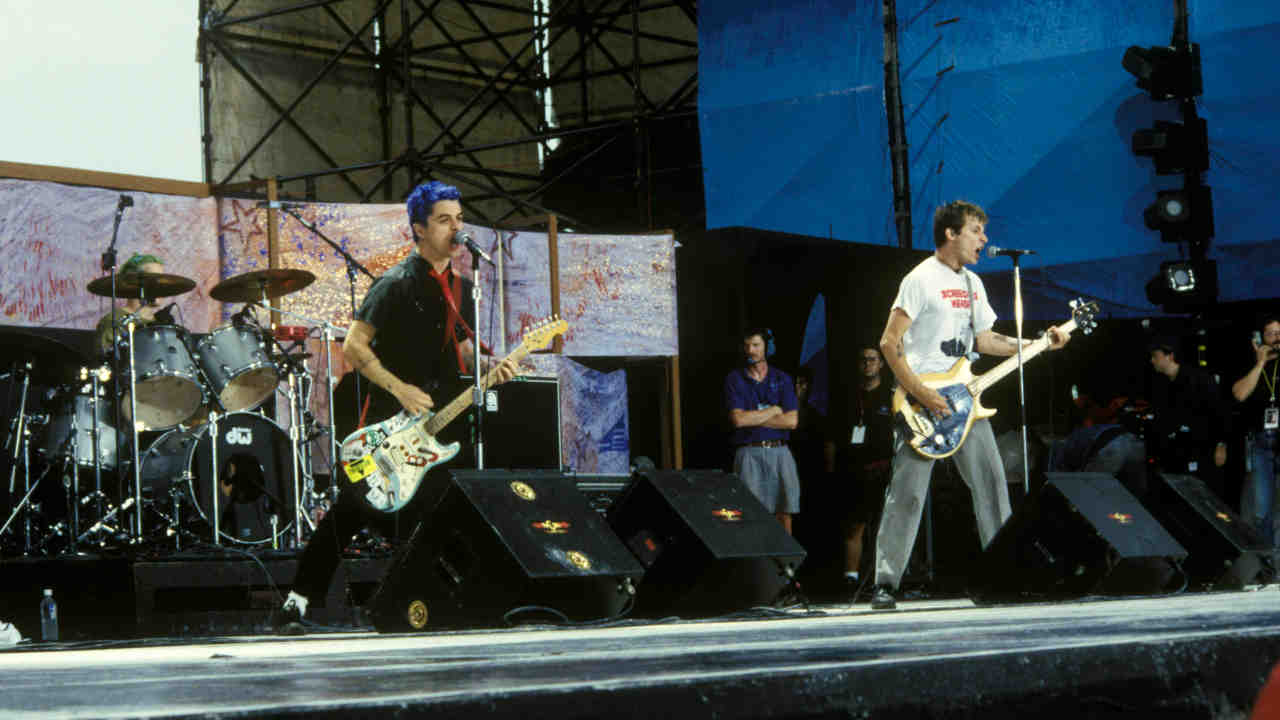 Green Day performing onstage at the Woodstock &amp;rsquo;94 festival