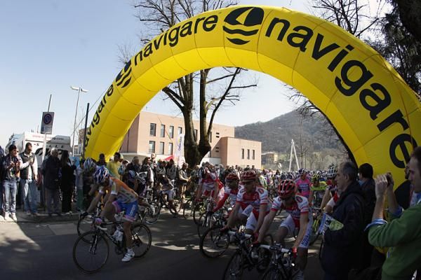 The peloton rolls off the start line in Casalecchio de Reno.