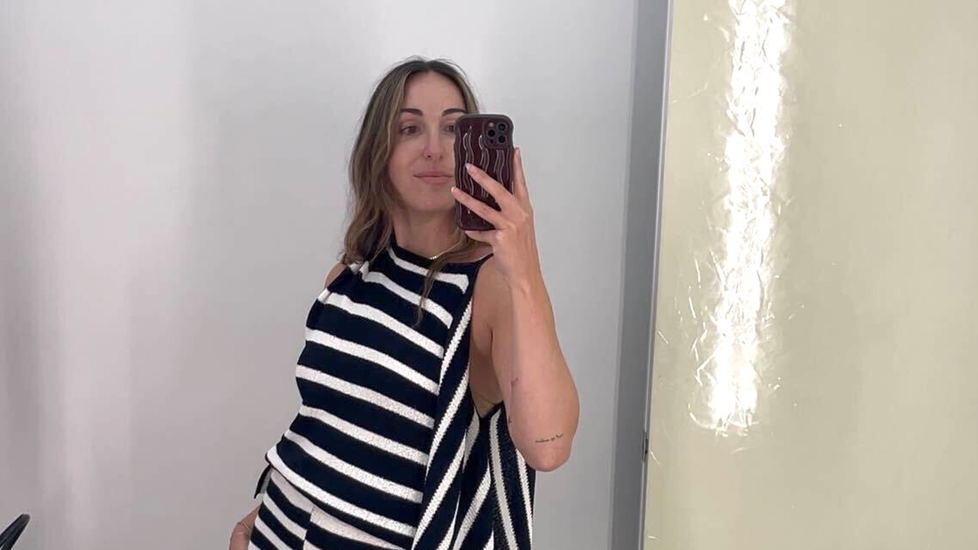 Anna LaPlaca wearing a Proenza Schouler striped top and skirt