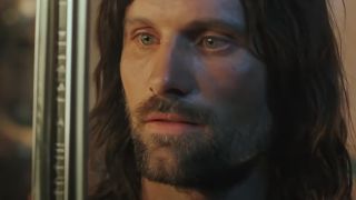 Viggo Mortensen looks upon Andúril in The Lord of the Rings: The Return of the King.