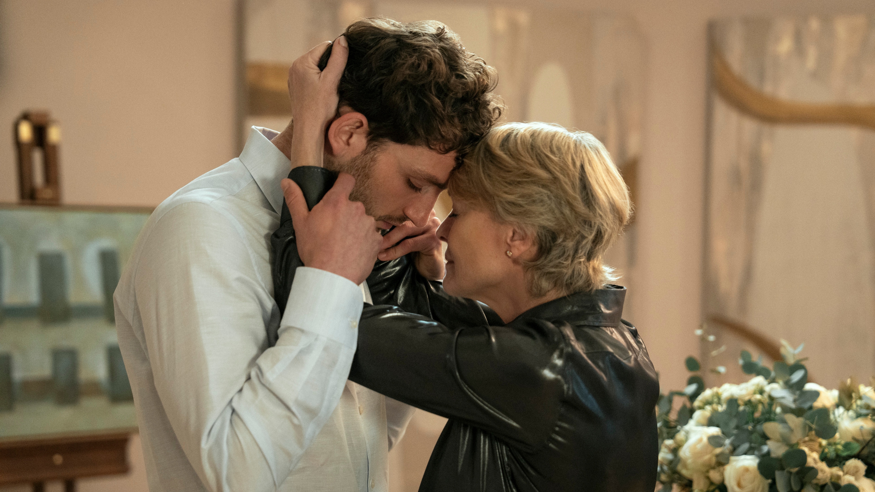 The Girlfriend&#039;s mother and son Laura and Daniel holding each other, their foreheads touching