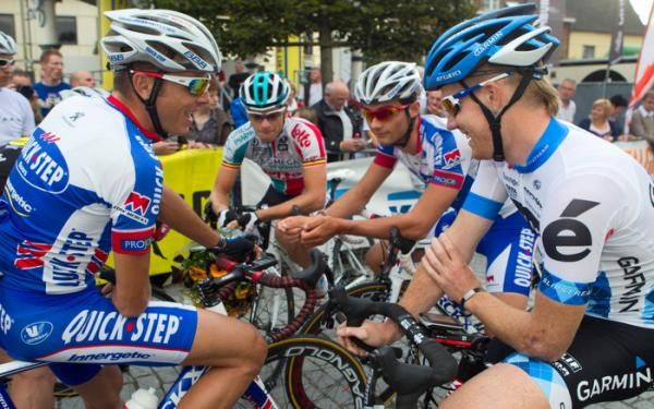 Riders have a discussion about the race