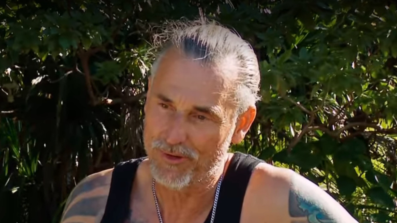 Coach Wade gets ready to knight Joe on Survivor 50.