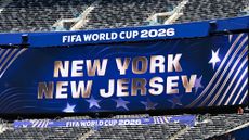 A digital billboard with the word New York New Jersey in large font at the World Cup in NJ