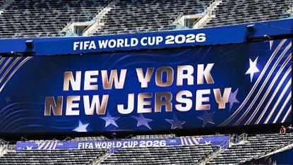 A digital billboard with the word New York New Jersey in large font at the World Cup in NJ