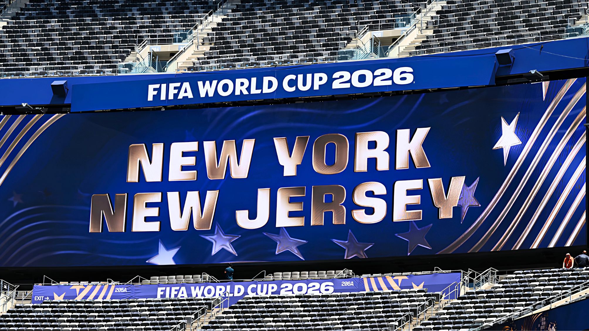 A digital billboard with the word New York New Jersey in large font at the World Cup in NJ