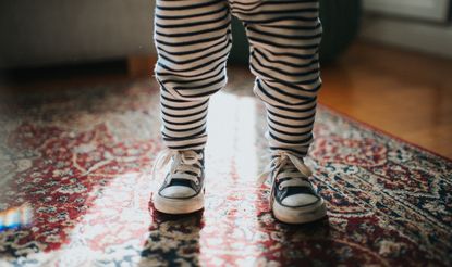 Toddler wearing sneakers